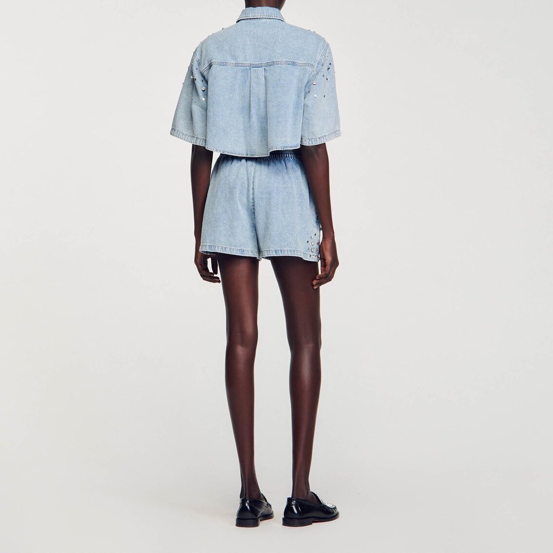 Short large en denim orné de strass Sandro seconde main photo 5
