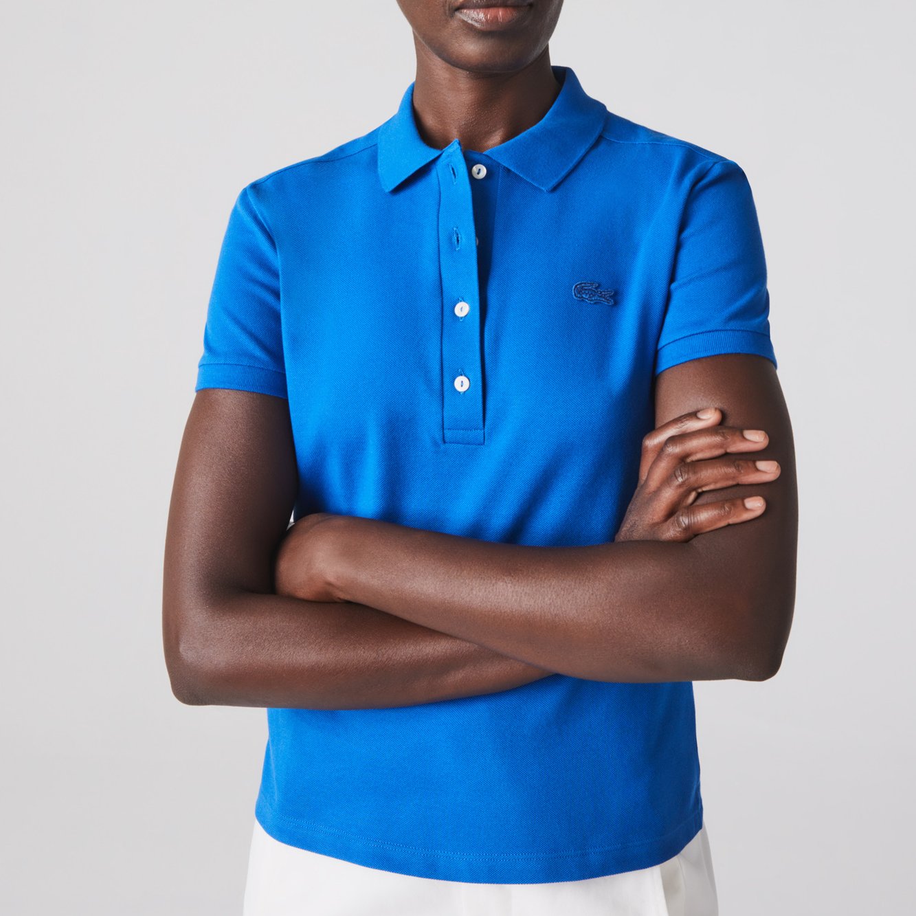 Polo femme Lacoste seconde main photo 2