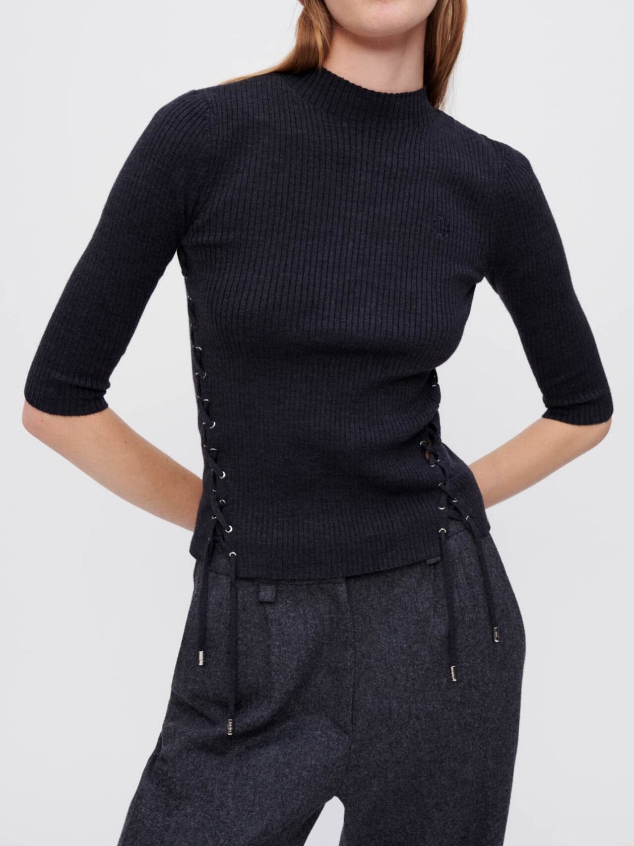 Product photo Close-fitting sweater with eyelets number 1